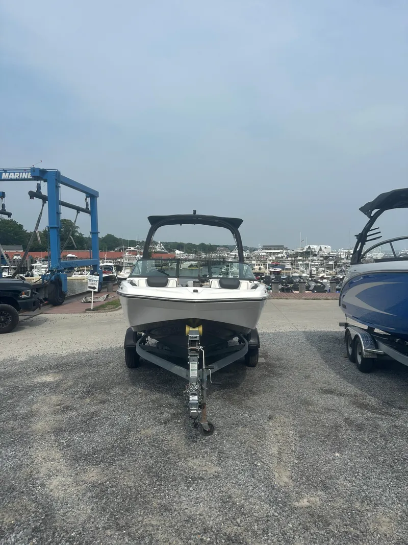 Slide: The Image of 2018 Yamaha Boats AR195 on trailer at marina, front view. - 3