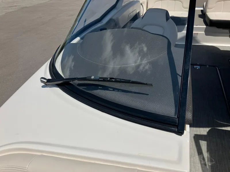 Slide: The Image of 2017 Chaparral 257 SSX boat windshield and interior seating view. - 14