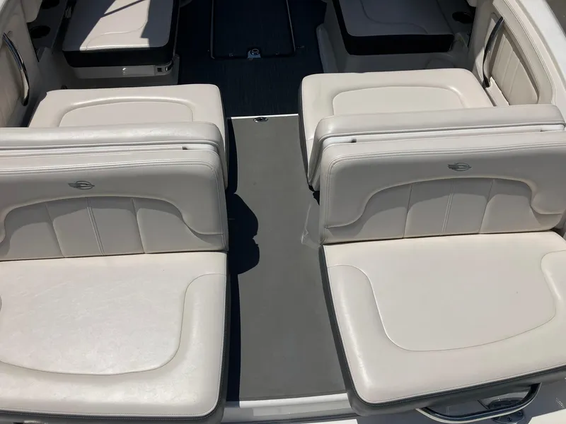 Slide: The Image of 2017 Chaparral 257 SSX boat interior with white leather seating. - 8