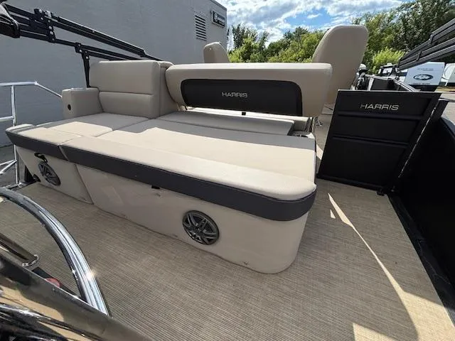 Slide: The Image of 2025 Harris CRUISER 230 SLDH pontoon boat with beige seating and sleek design. - 18