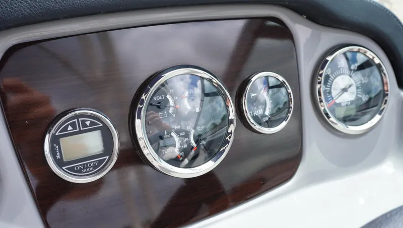 Slide: The Image of Dashboard of 2022 Chaparral 23 SSi boat with gauges and controls. - 15