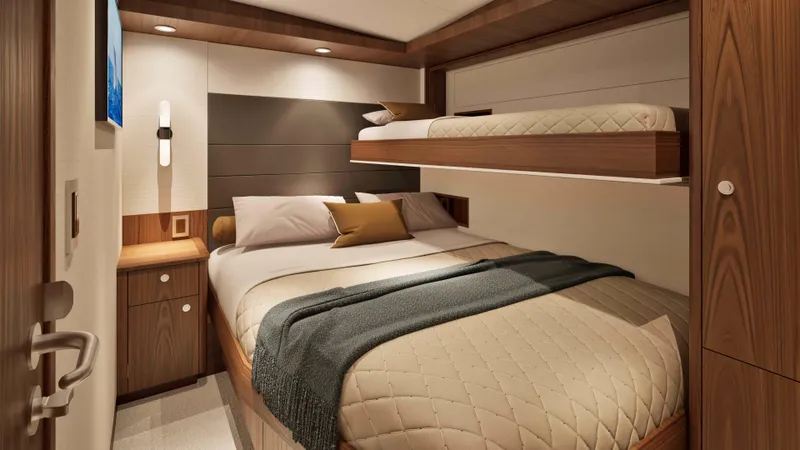 Slide: The Image of Luxurious cabin interior of 2026 Hatteras 77 Convertible yacht with cozy bedding. - 10