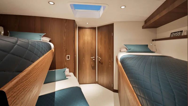 Slide: The Image of Luxurious cabin interior of 2026 Hatteras 77 Convertible yacht with modern wood finishes. - 12