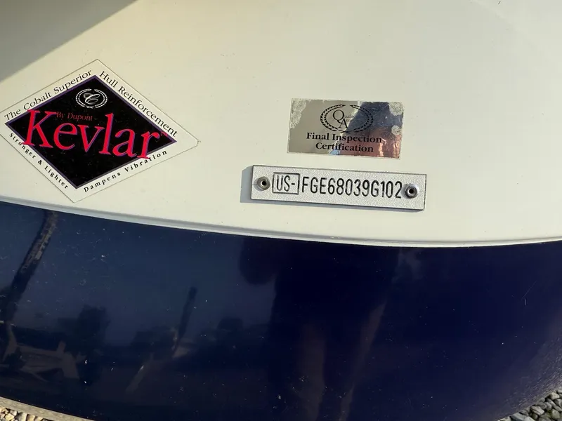 Slide: The Image of 2002 Cobalt 262 boat hull with Kevlar reinforcement and inspection certification. - 14