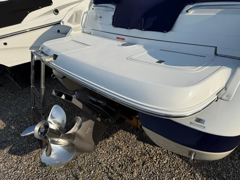 Slide: The Image of Rear view of a 2002 Cobalt 262 boat with propeller and swim platform. - 15