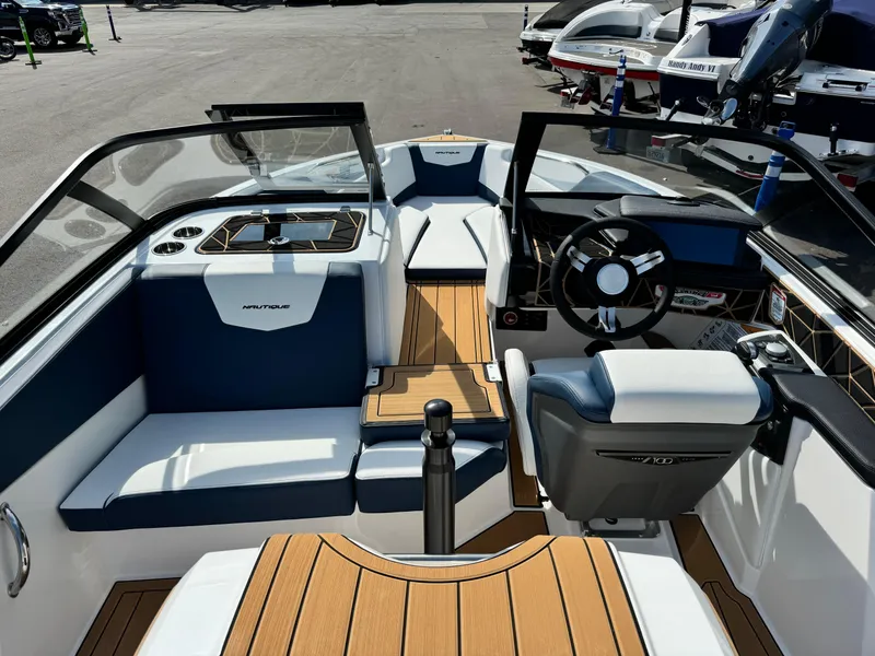 Slide: The Image of 2025 Nautique Ski 200 boat interior with sleek design and modern features. - 15