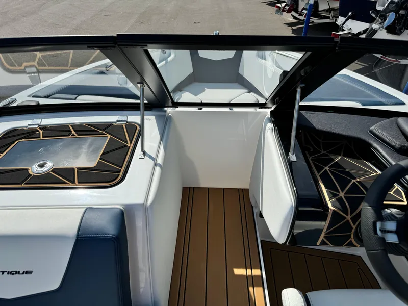 Slide: The Image of 2025 Nautique Ski 200 interior with sleek design and modern dashboard features. - 16