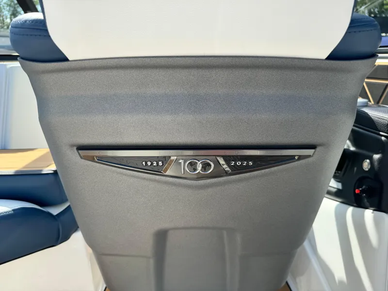 Slide: The Image of 2025 Nautique Ski 200 interior, featuring centennial emblem, celebrating 100 years (1925-2025). - 25