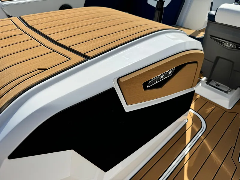 Slide: The Image of 2025 Nautique Ski 200 boat interior with sleek design and premium materials. - 9