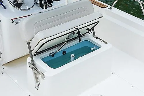 Slide: The Image of 2026 Boston Whaler 190 Montauk boat seat with built-in storage compartment. - 9