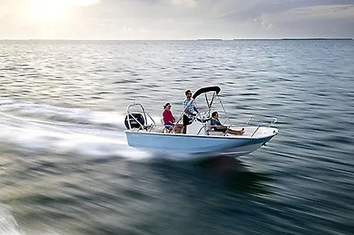 Slide: The Image of 2026 Boston Whaler 170 Montauk speeding on open water with passengers enjoying the ride. - 3