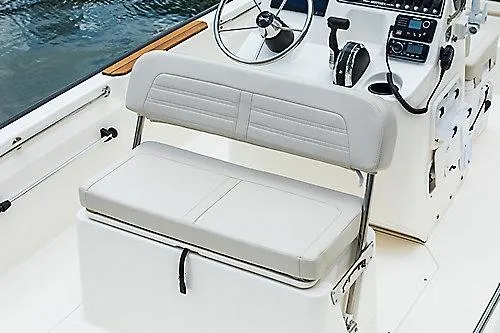 Slide: The Image of 2026 Boston Whaler 170 Montauk boat interior with steering console and seating. - 6