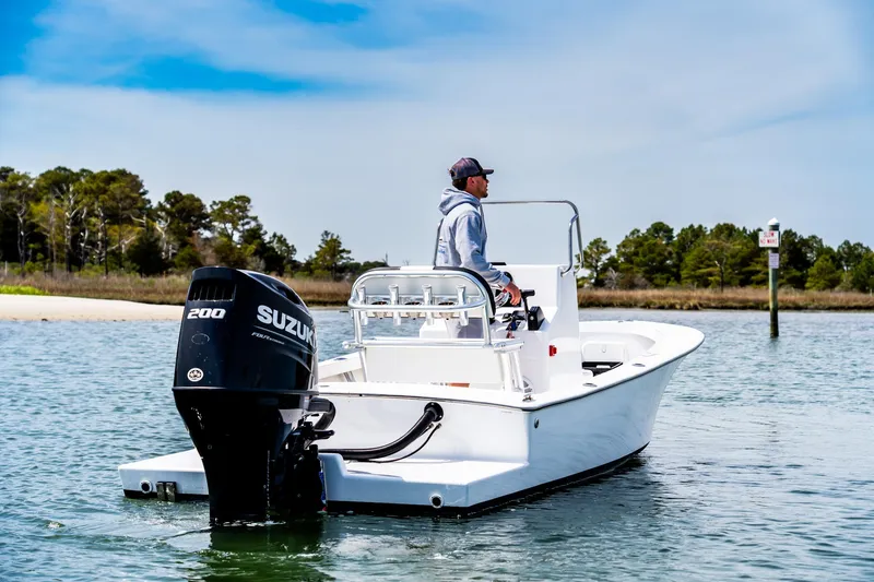 Slide: The Image of 1972 SeaCraft 20 Classic boat with Suzuki 200 engine on calm water. - 4