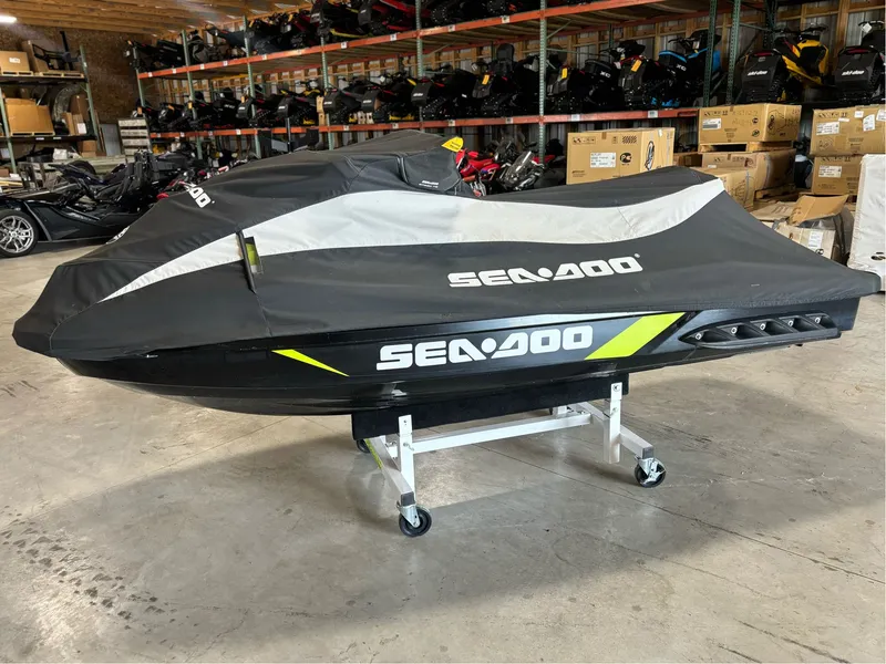 Slide: The Image of 2016 Sea-Doo GTI 130 jet ski covered in storage facility. - 5