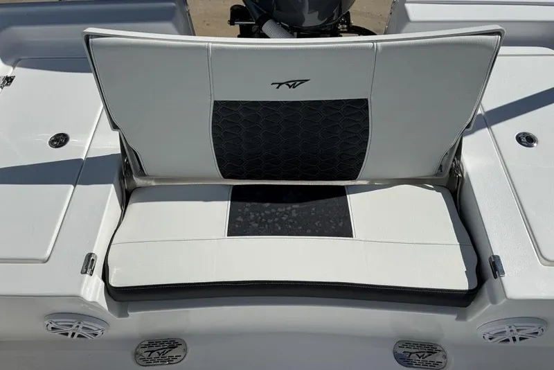 Slide: The Image of 2026 Tidewater 2300 Carolina Bay boat seat with black and white upholstery. - 30