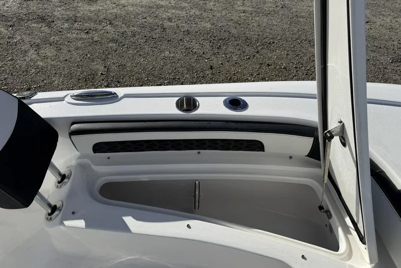 Slide: The Image of Open storage compartment on 2026 Tidewater 2300 Carolina Bay boat. - 6