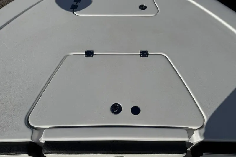 Slide: The Image of 2026 Tidewater 2300 Carolina Bay boat deck with storage hatch. - 7