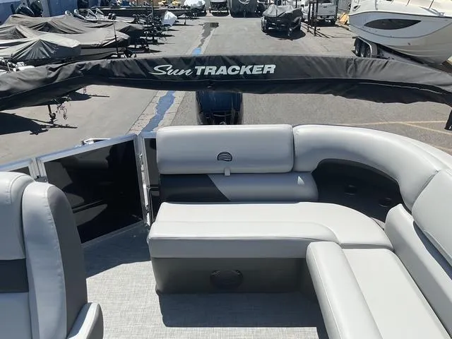 Slide: The Image of 2025 Sun Tracker Party Barge 20 DLX with spacious seating and sleek design. - 13