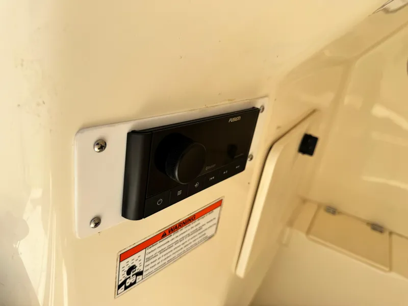 Slide: The Image of Control panel on a 2010 Pursuit C 280 Center Console boat interior. - 20