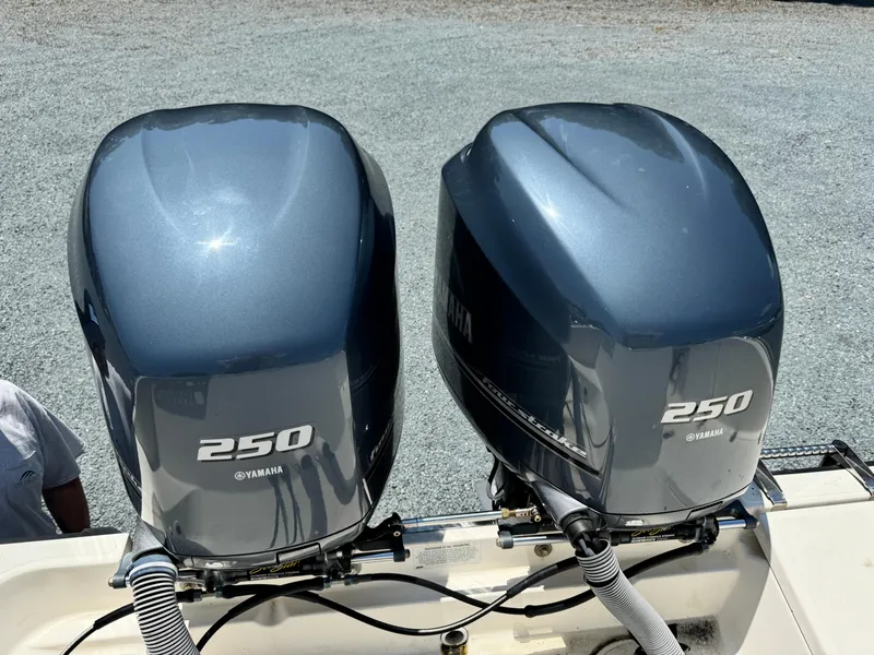 Slide: The Image of Twin Yamaha 250 outboard engines on a 2010 Pursuit C 280 Center Console boat. - 22