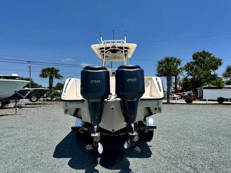 Slide: The Image of 2010 Pursuit C 280 Center Console boat with dual 250 horsepower engines. - 3