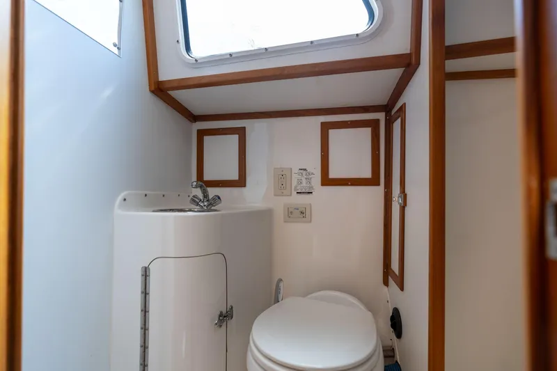 Slide: The Image of Compact boat bathroom with sink and toilet, Cascade Hign Side 1978 model. - 16