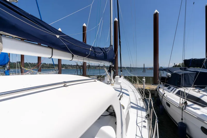Slide: The Image of Sailboat docked at marina, Cascade Hign Side 1978, clear blue sky. - 42