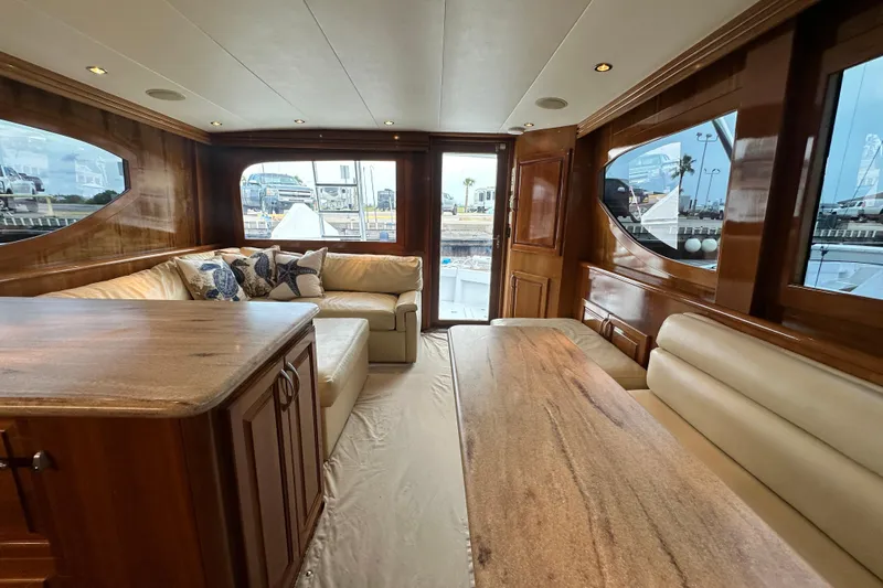 Slide: The Image of Luxurious interior of 2002 Hatteras 50 Convertible Sportfish yacht with elegant wood finishes. - 55