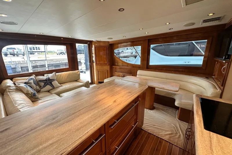Slide: The Image of Luxurious interior of 2002 Hatteras 50 Convertible Sportfish yacht with elegant wood finishes. - 57