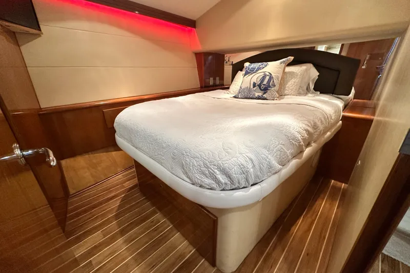 Slide: The Image of Luxurious bedroom interior of 2002 Hatteras 50 Convertible Sportfish yacht with elegant wood flooring. - 70