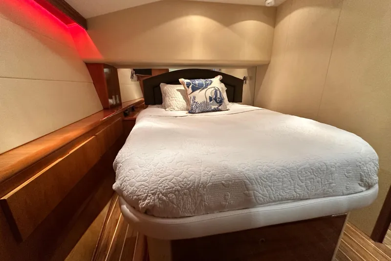 Slide: The Image of Luxurious bedroom interior of 2002 Hatteras 50 Convertible Sportfish yacht. - 71