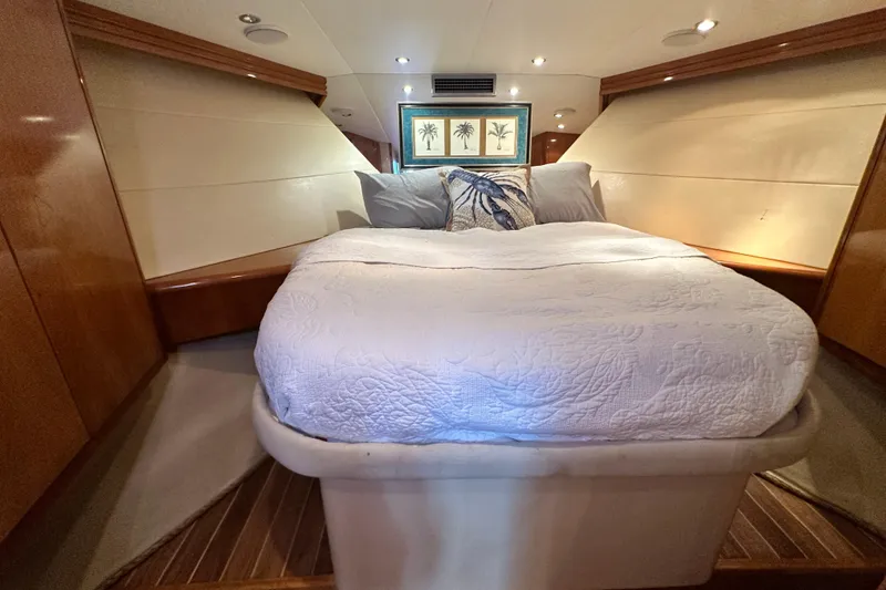 Slide: The Image of Luxurious bedroom interior of 2002 Hatteras 50 Convertible Sportfish yacht. - 86