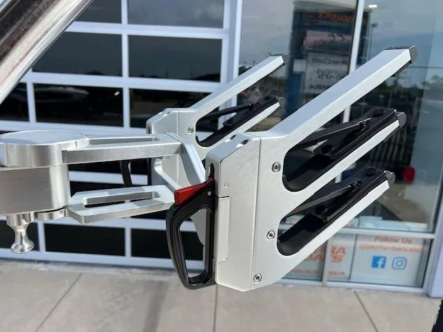 Slide: The Image of Wakeboard rack on 2025 MasterCraft NXT23 boat, silver and black design. - 16