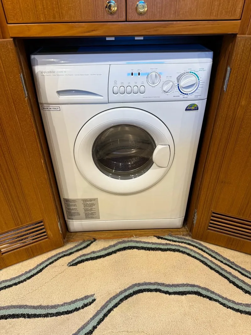 Slide: The Image of Washing machine in wooden cabinet on Jefferson Rivanna 50 SDMY yacht, 2005 model. - 13