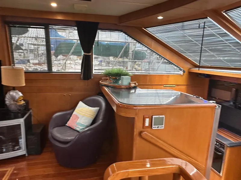 Slide: The Image of Luxurious interior of 2005 Jefferson Rivanna 50 SDMY yacht with modern seating and decor. - 19