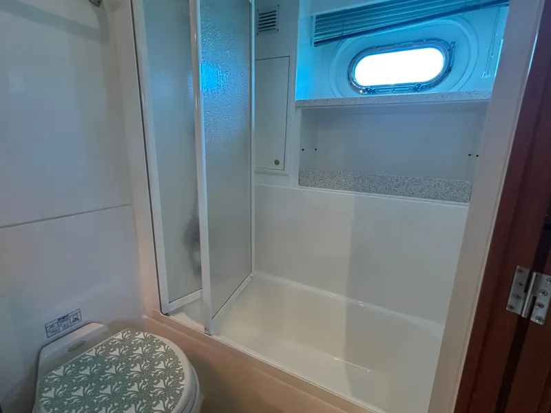 Slide: The Image of Bathroom interior of 2005 Jefferson Rivanna 50 SDMY yacht with shower and toilet. - 30