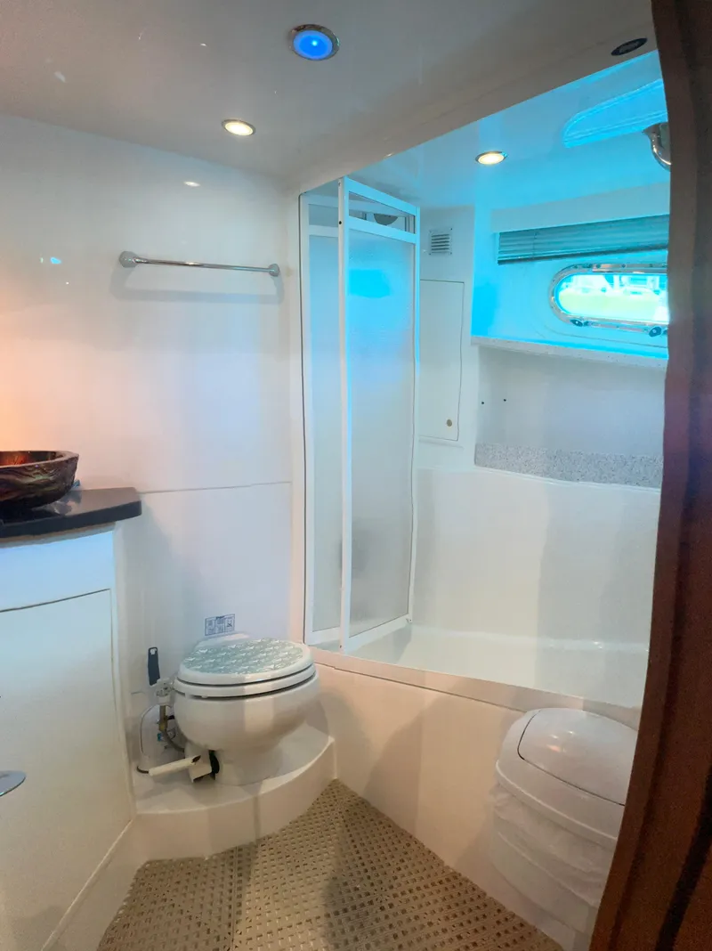 Slide: The Image of Bathroom interior of 2005 Jefferson Rivanna 50 SDMY yacht with shower and toilet. - 31