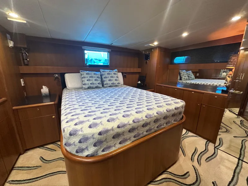 Slide: The Image of Luxurious bedroom interior of 2005 Jefferson Rivanna 50 SDMY yacht with elegant wood finish. - 32