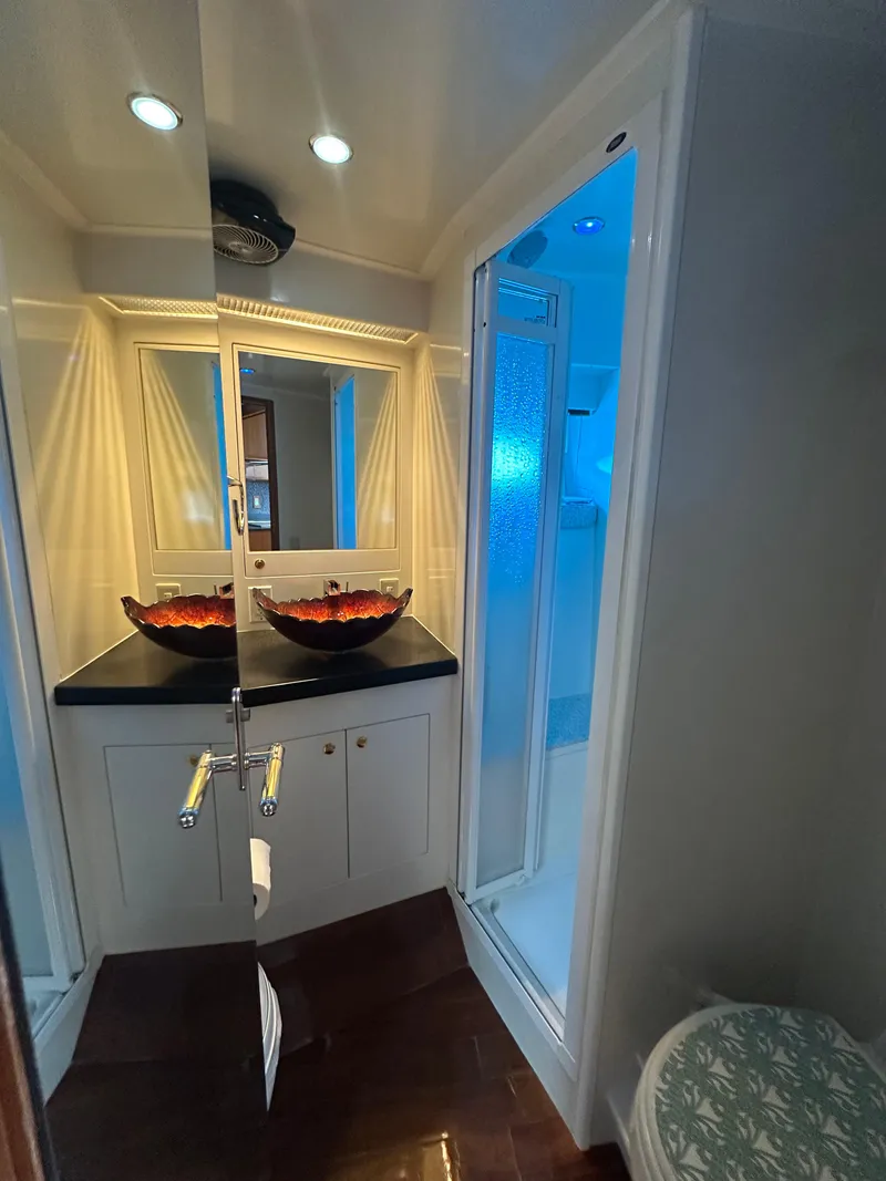 Slide: The Image of Luxurious bathroom in 2005 Jefferson Rivanna 50 SDMY yacht with modern fixtures and elegant design. - 46