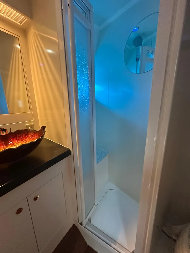 Slide: The Image of Compact bathroom with shower in 2005 Jefferson Rivanna 50 SDMY yacht. - 47