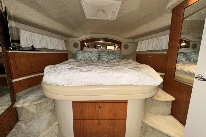 Slide: The Image of Luxurious bedroom interior of 2001 Sea Ray 400 Sedan Bridge yacht. - 47