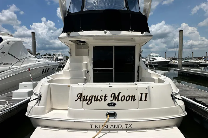Slide: The Image of 2001 Sea Ray 400 Sedan Bridge yacht named "August Moon II" docked at Tiki Island, TX. - 5