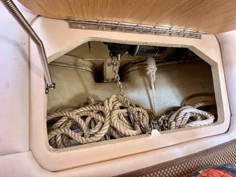 Slide: The Image of Storage compartment with ropes in a 2018 Wellcraft 290 Coastal boat. - 31