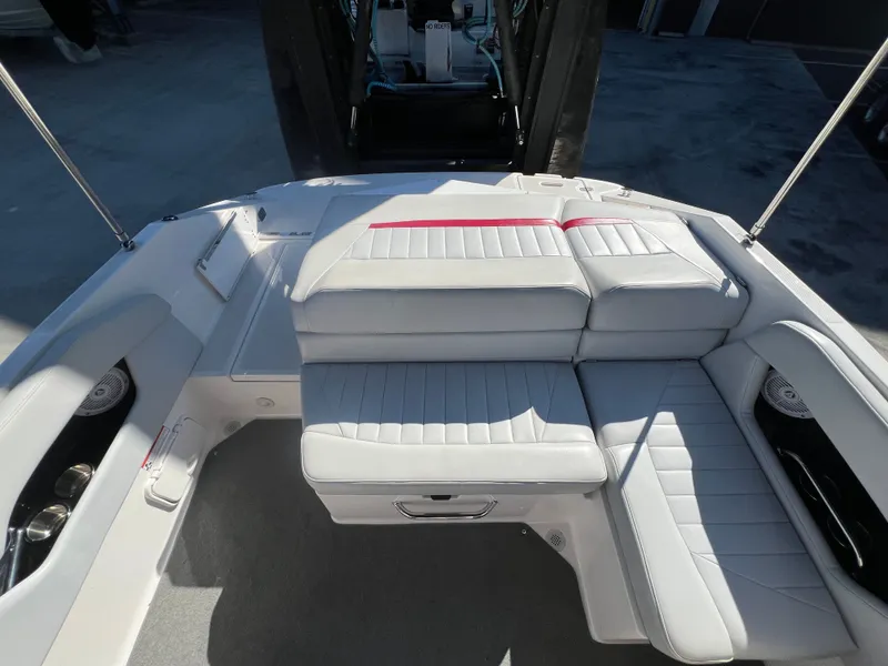 Slide: The Image of Interior of a 2007 Regal 2000 boat with white leather seating. - 10
