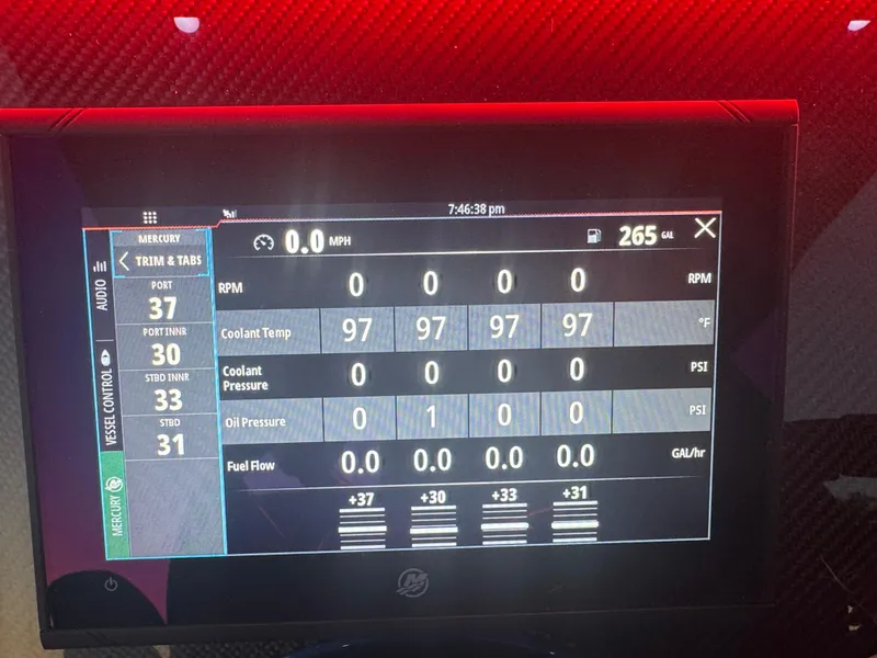Slide: The Image of Digital dashboard of a 2023 Fountain 38 SC boat displaying engine metrics and fuel levels. - 25