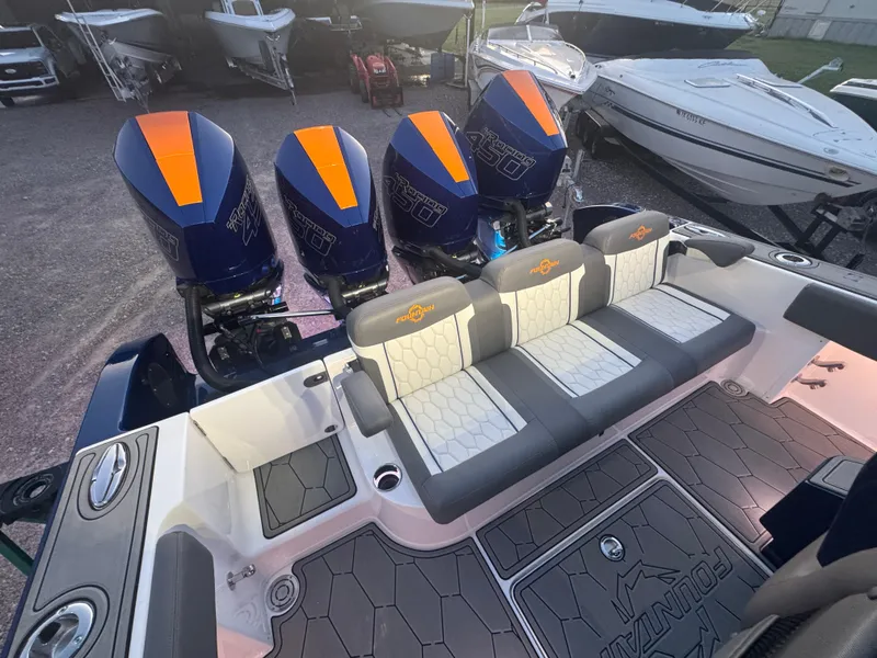 Slide: The Image of 2023 Fountain 38 SC boat with quad outboard engines and stylish seating. - 26