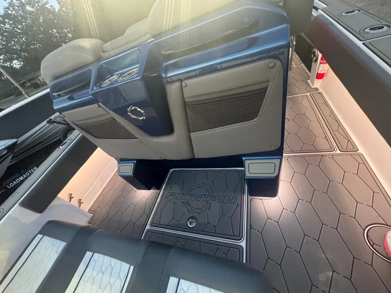 Slide: The Image of Interior of 2023 Fountain 38 SC boat with stylish seating and flooring. - 39
