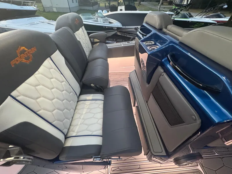 Slide: The Image of 2023 Fountain 38 SC boat interior with luxurious seating and modern design. - 41