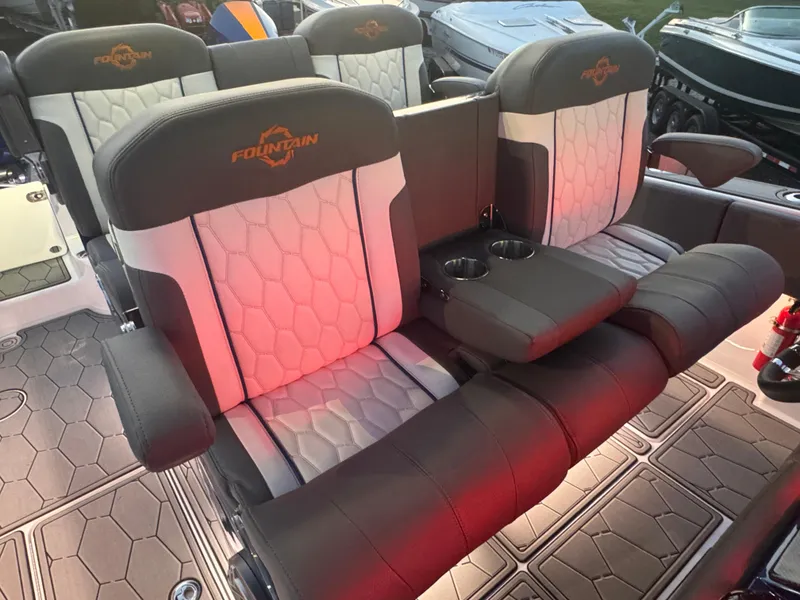 Slide: The Image of 2023 Fountain 38 SC boat seats with cup holders, featuring stylish upholstery and modern design. - 47