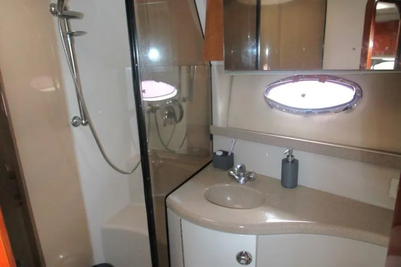 Slide: The Image of Bathroom interior of 2004 Regal Commodore 3860 yacht with shower and sink. - 18
